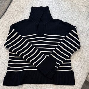 Elegant Black and White Striped Turtleneck Sweater